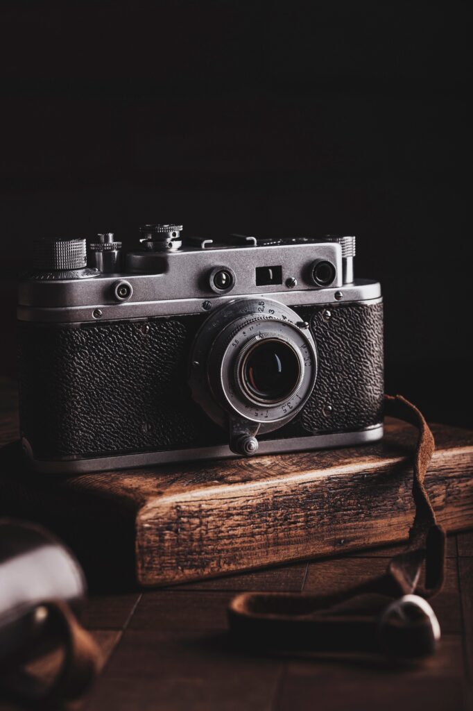 Vintage camera on a wooden table